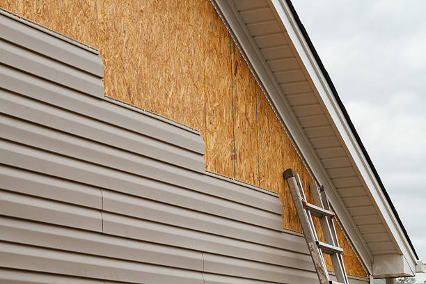 Professional Siding Contractor technician working in Audubon, NJ